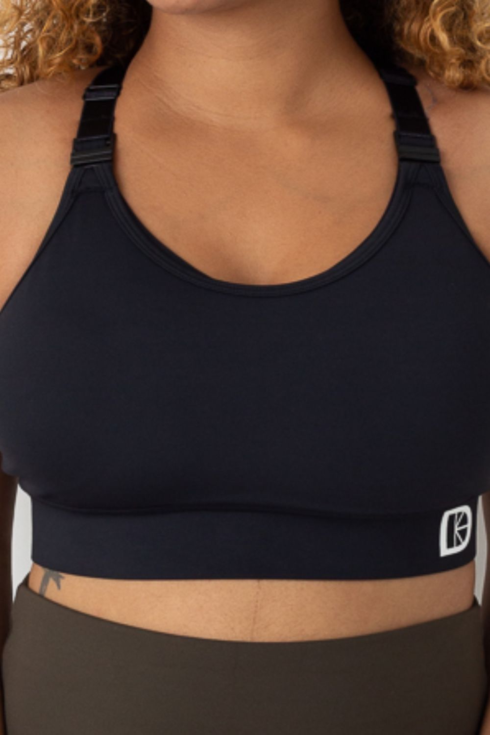 Front view of black breastfeeding sports bra